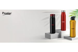 Three TTK Prestige reusable water bottles (black, red, and gold)