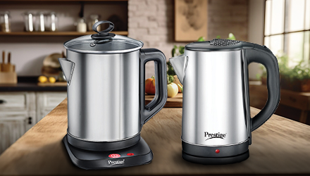Two Prestige electric kettles, one with glass lid, on a kitchen countertop