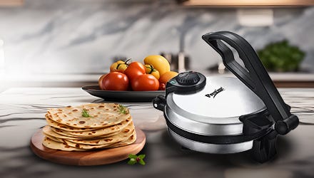 Prestige Roti Maker on a kitchen counter with a stack of rotis