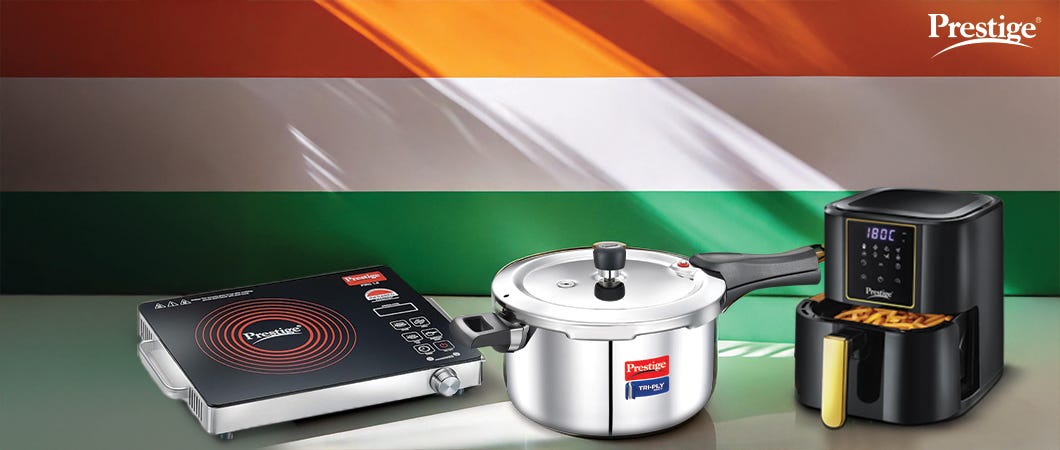 Prestige home and kitchen appliances featuring an induction cooktop, pressure cooker, and air fryer with discounts.